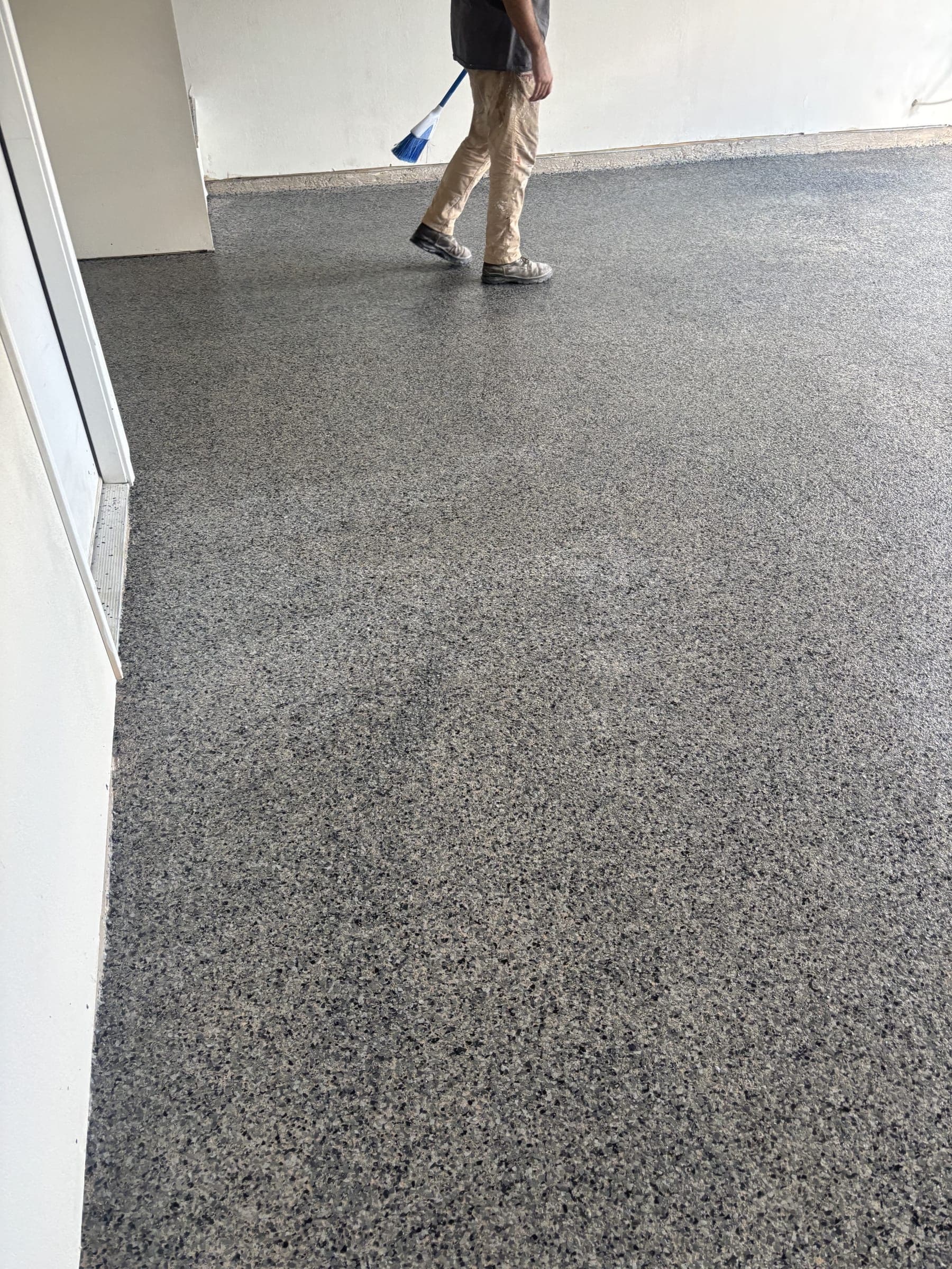 Grey flake epoxy floor coating, freshly finished